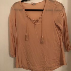Peach, criss-crossed, blouse